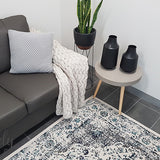 Awaken Ivory Blue Black Oriental Rug