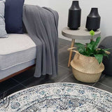 Awaken Ivory Blue Black Oriental Round Rug
